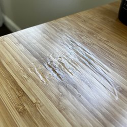 Prestige Moving & Storage - Bamboo desktop left my home in perfect condition. Looks like someone used the claw end of a hammer on it. Clearly not an accidental scratch.