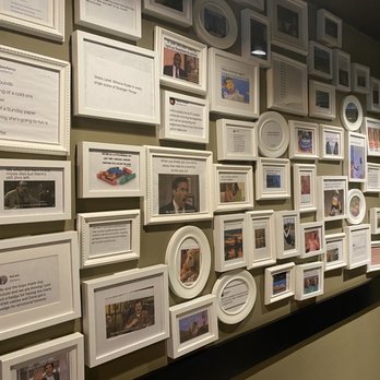 Cilantro And Chive - a wall of framed photos - Desserts Near Me - Red Deer, Alberta