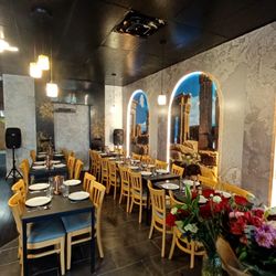 Caspienne - The dining room of our restaurant depicting a warm Persian environment.