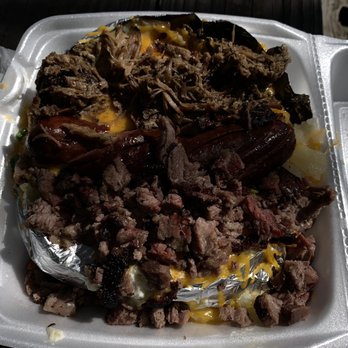 Rogers BBQ Barn - BBQ Bomb Potato w chopped beef, pulled pork, and sliced sausage - Barbeque Near Me - Beaumont, Texas Rogers BBQ Barn - BBQ Bomb Potato w chopped beef, pulled pork, and sliced sausage - Barbeque Near Me - Beaumont, Texas