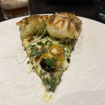 Lady Bird Cultural Society - Slice of pesto pizza - Cocktail Bars Near Me - Bend, Oregon Lady Bird Cultural Society - Slice of pesto pizza - Cocktail Bars Near Me - Bend, Oregon