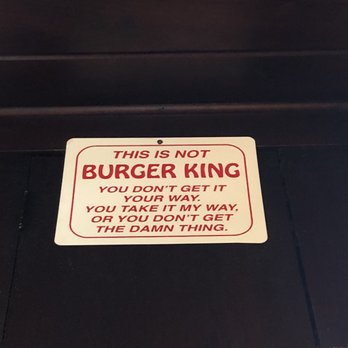 Louis' Lunch - One of the signs inside the restaurant - Burgers Near Me - New Haven, Connecticut Louis' Lunch - One of the signs inside the restaurant - Burgers Near Me - New Haven, Connecticut