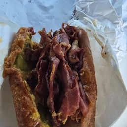 Half of a pastrami.. sorry took a bite out of the other half before I remembered to take the photo. Half of a pastrami.. sorry took a bite out of the other half before I remembered to take the photo.