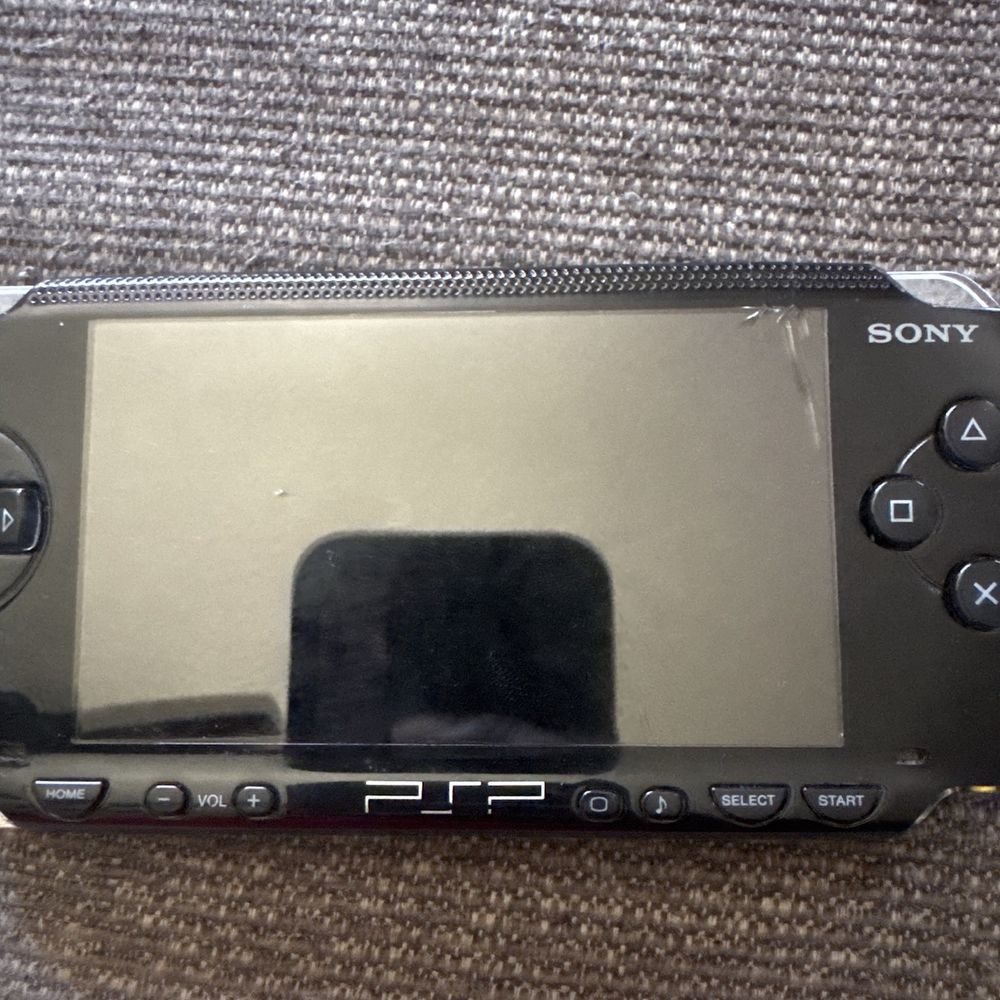 Hi-Tech Repair - The PSP before (can see the cracked screen above) - IT Services & Computer Repair Near Me - West Palm Beach, Florida