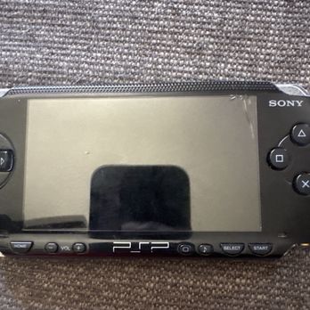 Hi-Tech Repair - The PSP before (can see the cracked screen above) - IT Services & Computer Repair Near Me - West Palm Beach, Florida