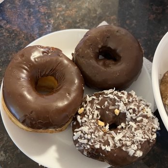 Daily Donuts - Chocolate Raised Donut, Chocolate Cake Donut, and chocolate coconut donut - Donuts Near Me - Sunnyvale, California