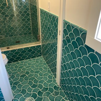 Alex's Custom Tile - a bathroom with a shower - General Contractors Near Me