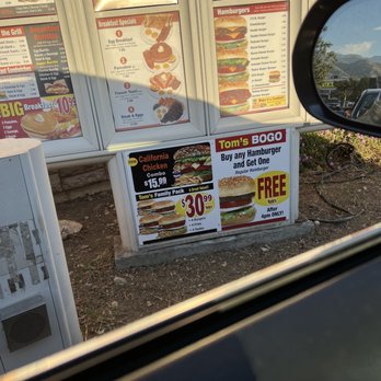 Super Tom's Burgers - Sign says "Buy ANY hamburger and get 1 free". Ordered a Jr. Cheeseburger after 4pm & they refused to honor the offer - Fast Food Near Me - Azusa, California Super Tom's Burgers - Sign says "Buy ANY hamburger and get 1 free". Ordered a Jr. Cheeseburger after 4pm & they refused to honor the offer - Fast Food Near Me - Azusa, California