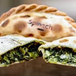 Bien Argentino - Spinach empanadas, chopped spinach , onions , parmesan cheese.
