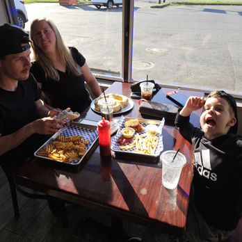 Mr. Y's Pizza N Fries - My daughter trying to get out of the photo. Dining area is small but clean and comfortable. - Pizza Near Me - Fallston, Maryland Mr. Y's Pizza N Fries - My daughter trying to get out of the photo. Dining area is small but clean and comfortable. - Pizza Near Me - Fallston, Maryland