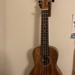 Big Island Guitars "music Lives Here" - Beautiful Koa Ukulele.  Perfect for a "hobby" player. Sounds beautiful!