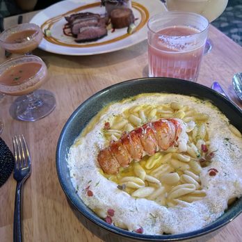 Seven Reasons - [DRINKS] Negroni Andino + Not Your Traditional Piña Colada  [ENTRÉES] Cavatelli + Lobster a la Huancaína + The Duck Dilemma - Latin American Near Me - Washington, DC, District of Columbia
