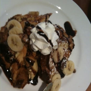 Meli Cafe - Reese's peanut butter banana French toast. - Breakfast & Brunch Near Me - Chicago, Illinois Meli Cafe - Reese's peanut butter banana French toast. - Breakfast & Brunch Near Me - Chicago, Illinois