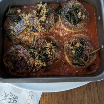 Sorelle - Rotolo al Forno - Wood-Fired rolled pasta with provolone picante, rapini, and suckling pig sugo. - Italian Near Me - Charleston, South Carolina Sorelle - Rotolo al Forno - Wood-Fired rolled pasta with provolone picante, rapini, and suckling pig sugo. - Italian Near Me - Charleston, South Carolina