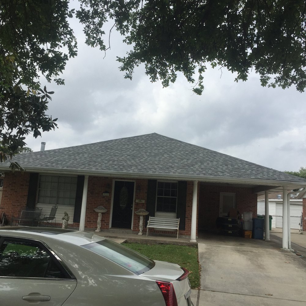 Slide of American Men Roofing