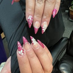 Beautiful flower and rhinestone nails!
