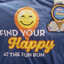 Back of the soft t-shirt and finishers medal, 2025