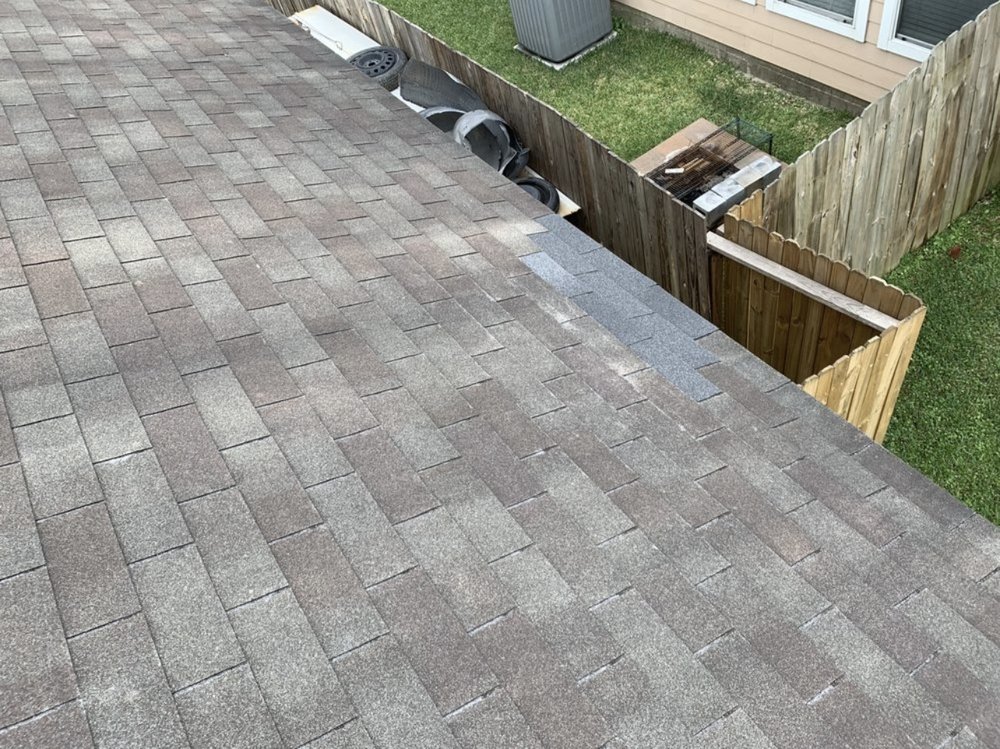 Slide of Redeemer Roofing