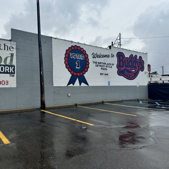 Buddy's Pizza - The outside of the building just as you enter the parking lot. - Pizza Near Me - Detroit, Michigan