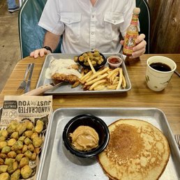 Chicken fried steak with fried okra and fries; a single pancake with a fried okra side order. Chicken fried steak with fried okra and fries; a single pancake with a fried okra side order.