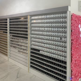 Inspire Nail Bar - A wall of products. - Nail Salons Near Me - Washington, DC, District of Columbia