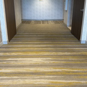 SpringHill Suites by Marriott Orlando Lake Nona - Hall way waiting for elevator - Hotels Near Me - Orlando, Florida SpringHill Suites by Marriott Orlando Lake Nona - Hall way waiting for elevator - Hotels Near Me - Orlando, Florida