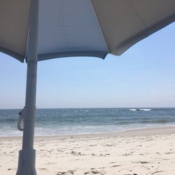 Catalina Beach Club - Beach was clean. Water was a bit rough. Cabana boys will set up our chairs and umbrella for you.