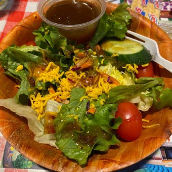 Huey's Downtown - House side salad with their 'hot' bacon honey dressing. Not spicy, served warm! - Burgers Near Me - Memphis, Tennessee Huey's Downtown - House side salad with their 'hot' bacon honey dressing. Not spicy, served warm! - Burgers Near Me - Memphis, Tennessee