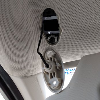 Fiesta Ford - $153 to fix this visor. Tape shall suffice for now. Glue later. - Auto Repair Near Me - Indio, California