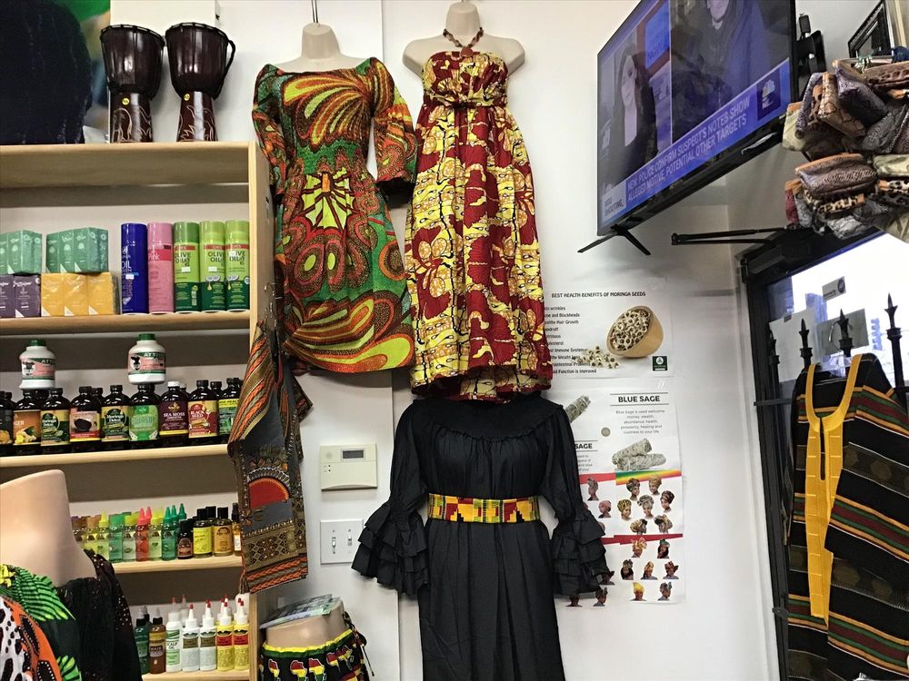 GIGI Hair Braiding & Boutique Logo