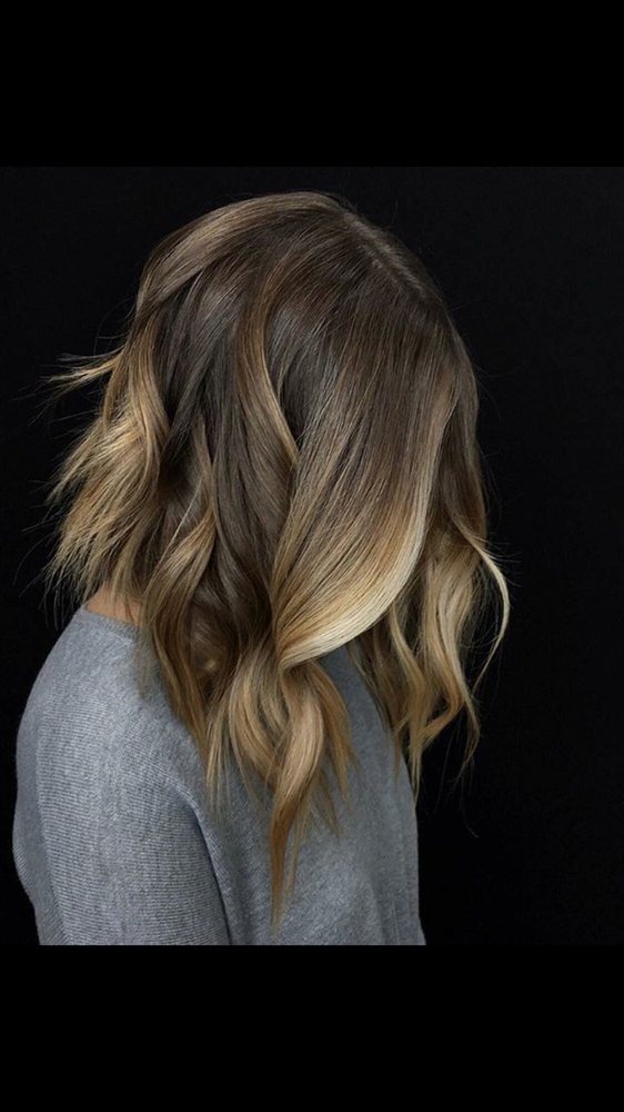 Joyce Ott's Hair Salon Logo