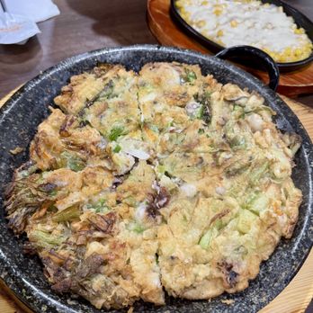 Gogiya Korean BBQ - 5/5 Seafood Pancake Came on sizzling plate which caused the bottem to have a nice cruncy texture which I have never had. A definate must try - Barbeque Near Me - Davie, Florida Gogiya Korean BBQ - 5/5 Seafood Pancake Came on sizzling plate which caused the bottem to have a nice cruncy texture which I have never had. A definate must try - Barbeque Near Me - Davie, Florida