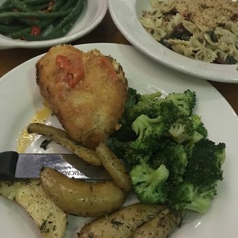 The Top - Stuffed chicken with crabmeat and two sides. I got the finger potatoes and broccoli - New American Near Me - Gainesville, Florida The Top - Stuffed chicken with crabmeat and two sides. I got the finger potatoes and broccoli - New American Near Me - Gainesville, Florida