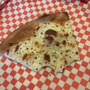 Grimaldi's Pizzeria - Half eaten white slice lunch special. I was too hungry! Sorry! - Pizza Near Me - Sparks, Nevada Grimaldi's Pizzeria - Half eaten white slice lunch special. I was too hungry! Sorry! - Pizza Near Me - Sparks, Nevada
