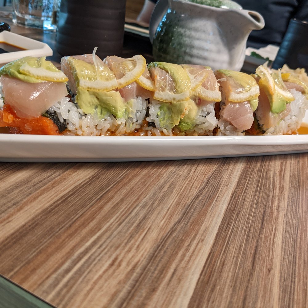 Kawa Sushi - Spicy pucker roll: spicy tuna, jalapeno and cucumber topped with yellowtail, avocado, lemon, and yuzu ponzo. Incredible!! - Sushi Bars Near Me - Rockford, Michigan