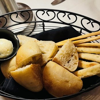 Luminaria Restaurant & Patio - a basket of breadsticks and butter - New American Near Me - Santa Fe, New Mexico Luminaria Restaurant & Patio - a basket of breadsticks and butter - New American Near Me - Santa Fe, New Mexico