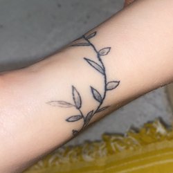 Under Your Skin Tattoos & Body Piercings - shaky line on the stem, some parts are thicker than others