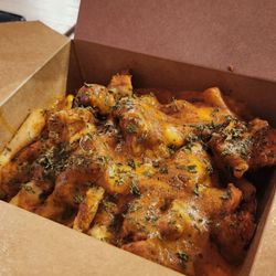 Holy Shakes - Butter Chicken Poutine
