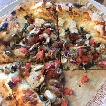 MOD Pizza - My pizza: no sauce, basil, garlic, mozzarella cheese, mold sausage, chicken, bacon, mushrooms, asiago cheese and minced tomatoes. - Fast Food Near Me - Daly City, California MOD Pizza - My pizza: no sauce, basil, garlic, mozzarella cheese, mold sausage, chicken, bacon, mushrooms, asiago cheese and minced tomatoes. - Fast Food Near Me - Daly City, California