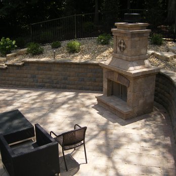 Finishing Touch Landscape - a fireplace and seating area - Landscape Architects or Designers Near Me - Saint Charles, Missouri