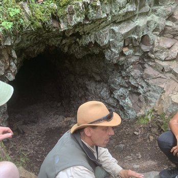 Wild Earth Llama Adventures - Stuart, sharing history and part of an off-the-beaten-path tour of a former mining area. - Hiking Near Me