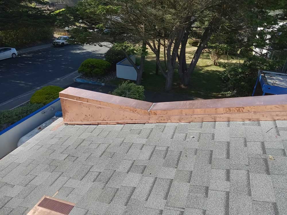 Slide of Henris Roofing