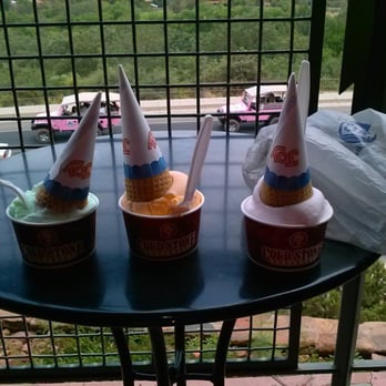 Cold Stone Creamery - our Ice cream cones  I think the green was mint, the orange is push up flavor pink = pink lemonade sorbet - Ice Cream & Frozen Yogurt Near Me - Sedona, Arizona