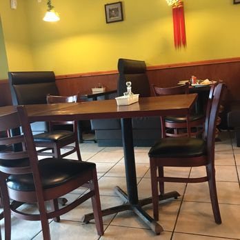 Dragon Cafe - a table and chairs in a restaurant - Chinese Near Me - Prospect, Kentucky Dragon Cafe - a table and chairs in a restaurant - Chinese Near Me - Prospect, Kentucky