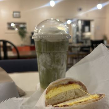 Cup A Joe - Bacon egg and cheese on croissant  Matcha coconut - Coffee & Tea Near Me - Raleigh, North Carolina