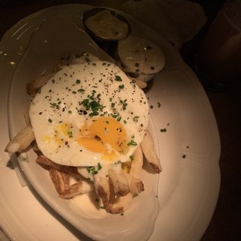 Au Cheval - $10 for fries with the egg and sauces, next time I'll skip it. - Bars Near Me - Chicago, Illinois