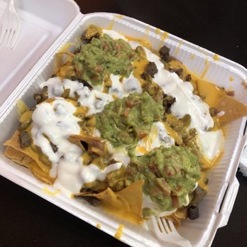 Maria's Ricos Tacos - Asada nachos w nacho cheese (5/5). SO GOOD. I can't decide if I like the nachos or the fries better. Get these! - Breakfast & Brunch Near Me - Inglewood, California