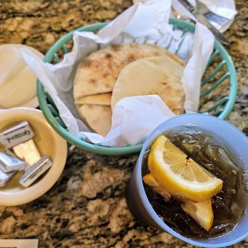 Shamshiri Restaurant - Complimentary Pita bread, healthful onion, butter. Persian iced tea - Persian/Iranian Near Me - Northridge, California Shamshiri Restaurant - Complimentary Pita bread, healthful onion, butter. Persian iced tea - Persian/Iranian Near Me - Northridge, California