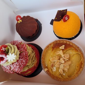 Moulin - Chocolate Mousse (top left), passion mango (top right), pistachio (bottom left), and pear tart (bottom right) - Bakeries Near Me - Newport Beach, California
