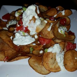 Cavanaugh's Grille - Homemade chips.  Just the right amount of blue cheese sauce.  I expected way too much.
